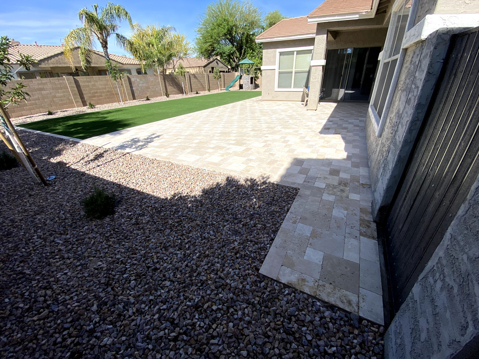 Artificial grass backyard transformation